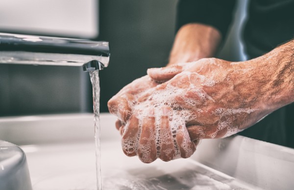 Man Washing Hands with Soap